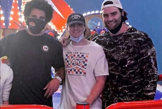 Jackson Coker with founder of Kg's Kids